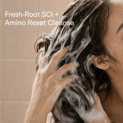 Oil-control solid shampoo bar being applied to wet roots